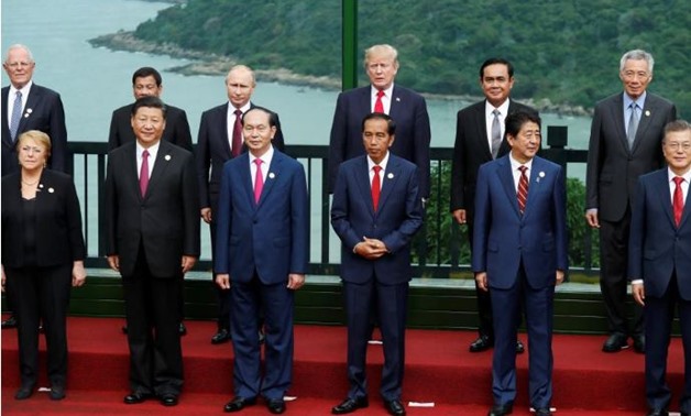 Leaders pose during the family photo session at the APEC Summit in Danang, Vietnam November 11, 2017. (Front L-R) Chile's President Michelle Bachelet, China's President Xi Jinping, Vietnam's President Tran Dai Quang, Indonesia's President Joko Widodo, Jap