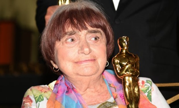 French filmmaker Agnes Varda holds her honorary Oscar at the 9th Annual Governors Awards gala in Hollywood, California - AFP