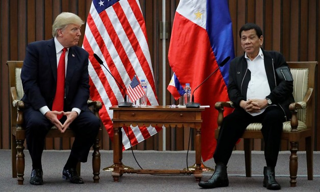 U.S. President Donald Trump holds a bilateral meeting with President of the Philippines Rodrigo Duterte alongside the ASEAN Summit in Manila, Philippines November 13, 2017. REUTERS/Jonathan Ernst