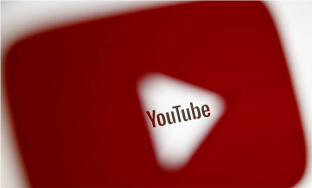  A 3D-printed YouTube icon is seen in front of a displayed YouTube logo in this illustration taken October 25, 2017 - REUTERS/Dado Ruvic/Ilustration/File Photo