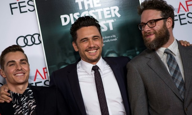 (L-R) Actor Dave Franco, actor/director James Franco and actor Seth Rogen attend The Disaster Artist Centerpiece Gala Presentation during AFI Film Festival, on November 12, 2017, in Hollywood, California - AFP/Frankie TAGGART