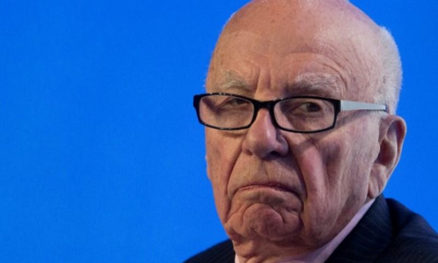 Rupert Murdoch, executive chairman of News Corporation, reacts during a panel discussion at the B20 meeting of company CEOs in Sydney, July 17, 2014 -
 REUTERS/Jason Reed//File Photo