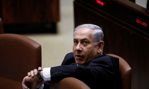FILE- Israeli Prime Minister Benjamin Netanyahu attends a session of the Knesset, the Israeli parliament, in Jerusalem November 13, 2017 - REUTERS/Ronen Zvulun