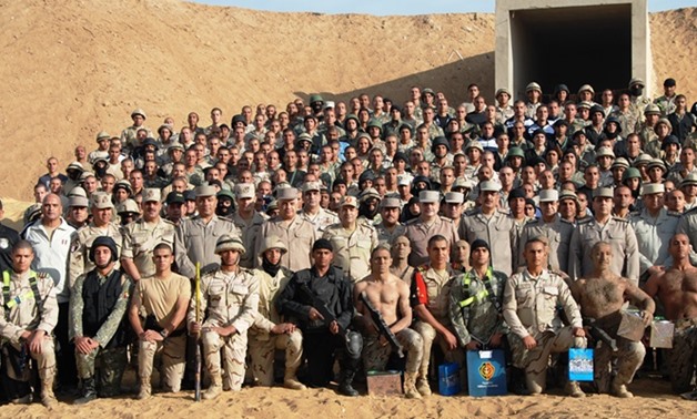 FILE – Students from different Egyptian universities, Egyptian Military Academy and Police Academy have undergone training 