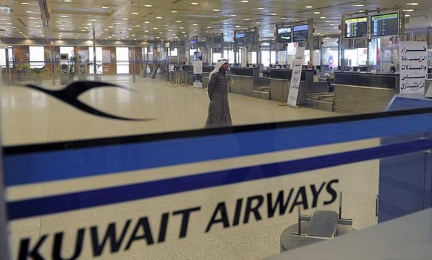 This March 18, 2012 photo shows a view of empty Kuwait Airways check-in counters at Kuwait Airport. (AFP Photo/Gustavo Ferrari)
