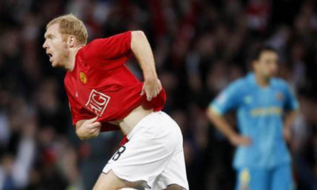 Manchester United's Paul Scholes celebrates scoring against Barcelona during their Champions League semi-final second leg football match at Old Trafford in Manchester April 29, 2008. REUTERS/Albert Gea