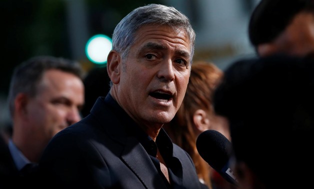 Director George Clooney is interviewed at the premiere for "Suburbicon" in Los Angeles, California, U.S., October 22, 2017. REUTERS/Mario Anzuoni