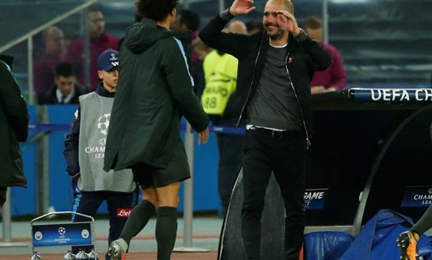 Champions League - S.S.C. Napoli vs Manchester City - Stadio San Paolo, Naples, Italy - November 1, 2017 Manchester City manager Pep Guardiola and Manchester City's Leroy Sane celebrate REUTERS