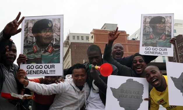Protesters gather calling for Zimbabwe President Robert Mugabe to step down, in Harare, Zimbabwe November 18, 2017. REUTERS/Philimon Bulawayo
