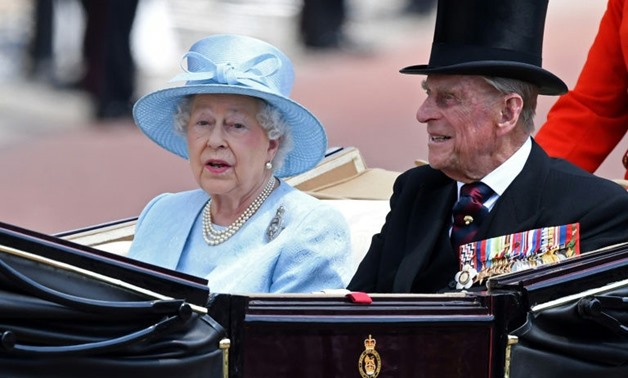 Queen Elizabeth II and Prince Philip will spend their anniversary with other members of the royal family -AFP