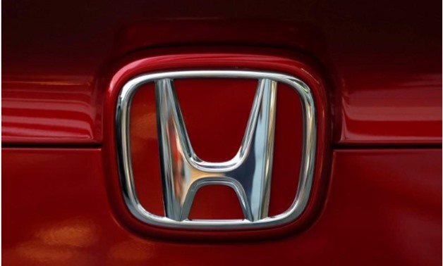 Honda Motor's logo is seen on Civic sedan car at its showroom in Tokyo, Japan October 4, 2017 -
 REUTERS/Kim Kyung-Hoon