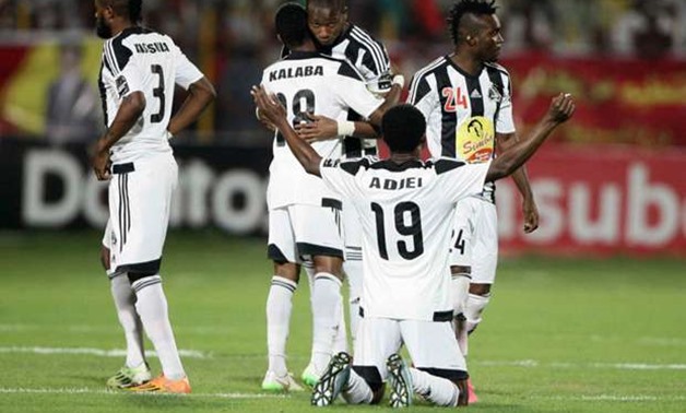 Bejaia’s Merveille Bope (L) vies with Mazembe’s Morgan Betorangal during the CAF Confederation cup final between Algerian Mouloudia Bejaia and Congolese TP Mazembe. AFP