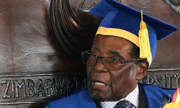 Zimbabwe President Robert Mugabe attends a university graduation ceremony in Harare, Zimbabwe, November 17, 2017. REUTERS/Philimon Bulawayo

