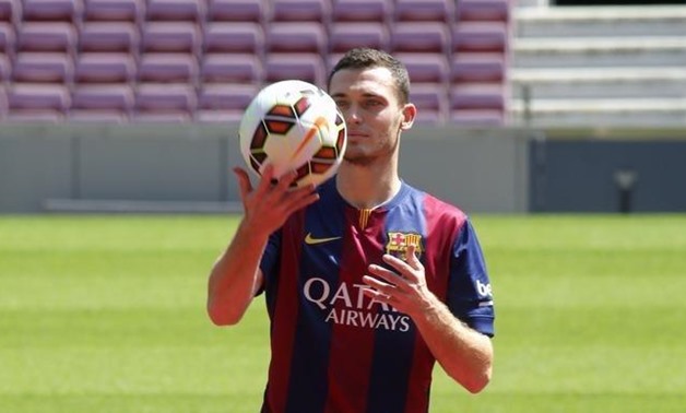 Thomas Vermaelen is pictured during his presentation at Nou Camp stadium in Barcelona, August 10, 2014. REUTERS/Gustau Nacarino