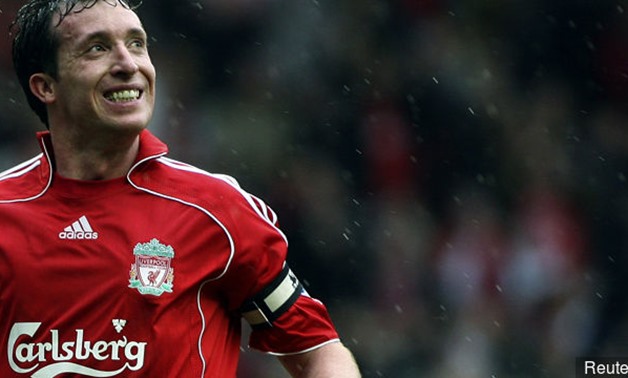 Liverpool's Robbie Fowler celebrates scoring for Liverpool - Reuters