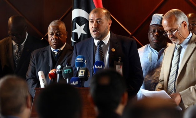 Salah Abu-Raguigah (C), Head of the department of African affaires in the Libyan Foreign Ministry in the National Accord Government, delivers a statement to the press in the presense of African ambassadors to Libya on November 19, 2017, in Tripoli - AFP  