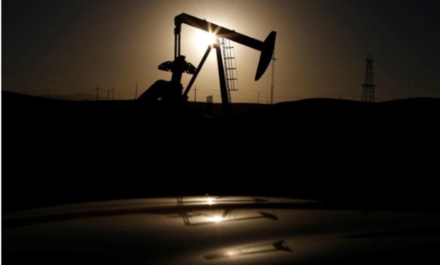 A pump jack is seen at sunrise near Bakersfield, California October 14, 2014 - REUTERS/Lucy Nicholson/File Photo