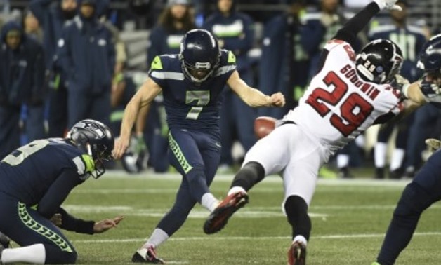 Blair Walsh of the Seattle Seahawks could have taken the game against the Atlanta Falcons to overtime but his game-tying field goal from 52 yards dropped just short - AFP/GETTY