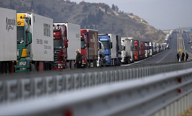 Truckers launched the blockade in response to a similar protest being held by farmers on the other side of the crossing - Reuters