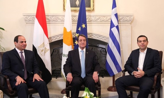 Egyptian President Abdel Fattah al-Sisi (L), Greek Prime Minister Alexis Tsipras (R), and Cypriot President Nicos Anastasiades talk during a meeting at the Presidential Palace in Nicosia, Cyprus November 21, 2017. REUTERS/Yiannis Kourtoglou