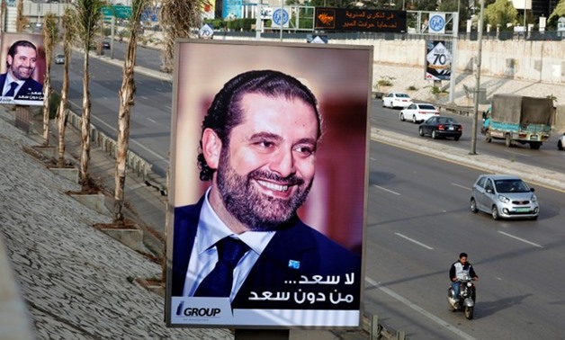 Posters depicting Saad al-Hariri, who announced his resignation as Lebanon's prime minister from Saudi Arabia, is seen at airport high way in Beirut, Lebanon November 19, 2017. REUTERS/Jamal Saidi

