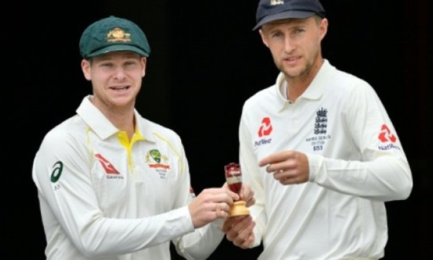 Australia's skipper Steve Smith (L) and Joe Root, Captain of England, pose at a media opportunity in Brisbane on November 22, 2017, on the eve of their first Ashes Test match - AFP / by Julian GUYER | 
