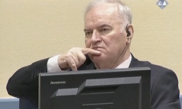 Ex-Bosnian Serb wartime general Ratko Mladic reacts in court at the International Criminal Tribunal for the former Yugoslavia (ICTY) in the Hague, Netherlands in this still image taken from a video released by the International Criminal Tribunal for the f