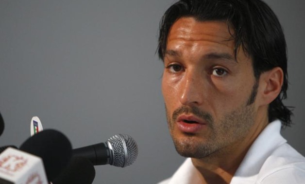 Gianluca Zambrotta answers a reporter's question during a news conference in Oberwaltersdorf June 11, 2008 - REUTERS/Tony Gentile/Files 