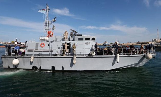Libyan Navy boat with migrants on board arrives at navy base in Tripoli, Libya November 23, 2017. REUTERS/Ismail Zitouny.
