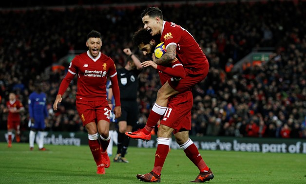 Soccer Football - Premier League - Liverpool vs Chelsea - Anfield, Liverpool, Britain - November 25, 2017 Liverpool's Mohamed Salah celebrates scoring their first goal with Philippe Coutinho and Alex Oxlade-Chamberlain REUTERS/Phil Noble