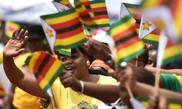 Zimbabweans celebrated the swearing-in of Emmerson Mnangagwa, Mugabe's successor - AFP