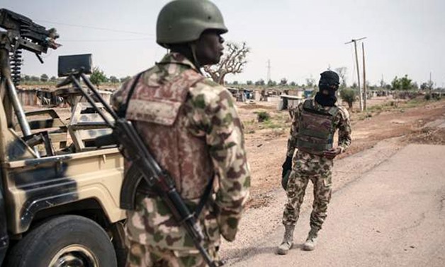 Nigerian soldiers are fighting Boko Haram militants in north-east Nigeria - AFP