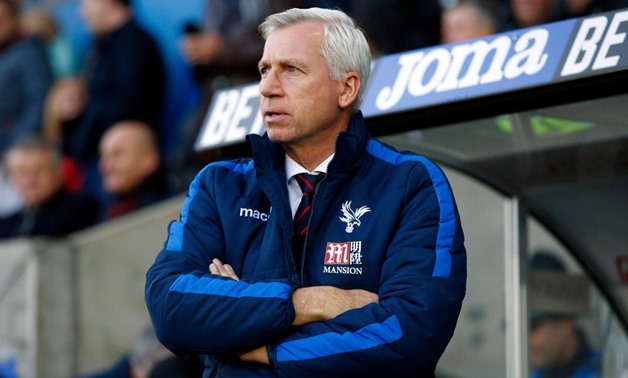 former Crystal Palace manager Alan Pardew watches from the dugout – Press image courtesy of Premier League’s official website