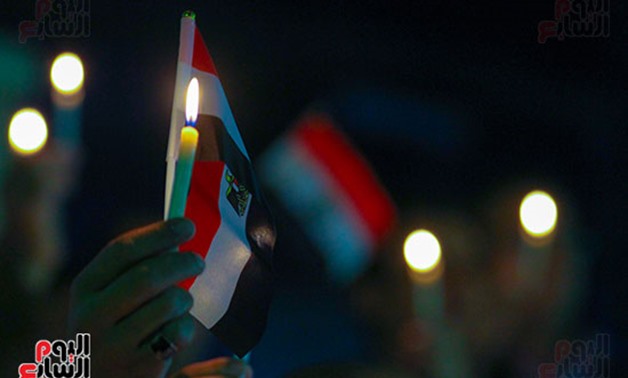 A candlelit demonstration to mourn Rawdah massacre