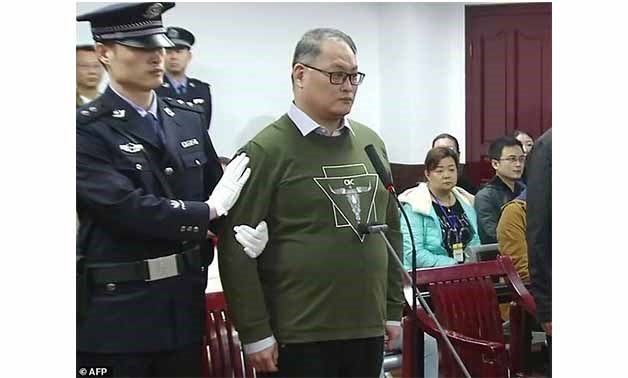 A video grab from footage on the website of Yueyang Intermediate People's Court shows activist Lee Ming-cheh, the first Taiwanese person to be convicted of subverting government power under China's criminal code - AFP