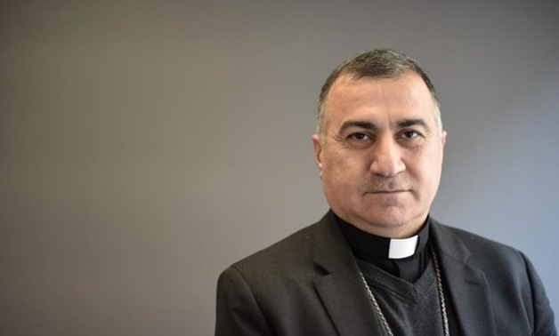 The Chaldean Archbishop of Irbil, Bashar Warda poses for a photo during an interview with AFP in Washington, DC, on Nov. 27,2017 - AFP