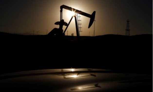 A pump jack is seen at sunrise near Bakersfield, California October 14, 2014 - REUTERS/Lucy Nicholson/File Photo