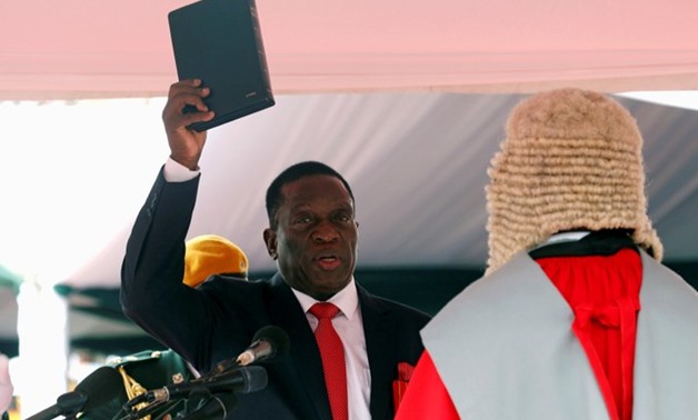 Emmerson Mnangagwa is sworn in as Zimbabwe's president in Harare, Zimbabwe, November 24, 2017. Picture taken November 24, 2017. REUTERS/Mike Hutchings