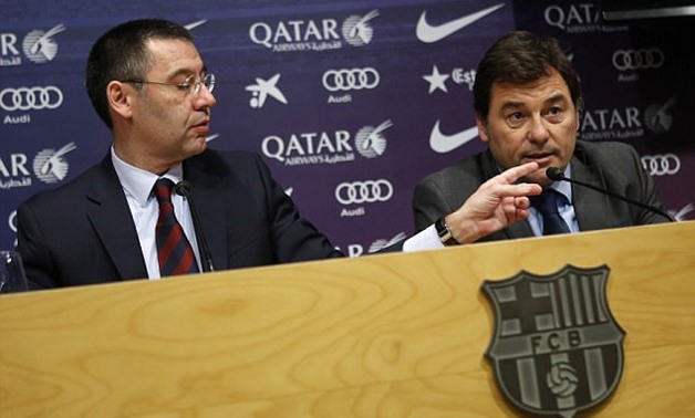 Arsenal`s head of football relations Raul Sanllehi (R) with Barcelona`s president Josep Bartomeu (L) in a press conference in Barcelona, REUTERS