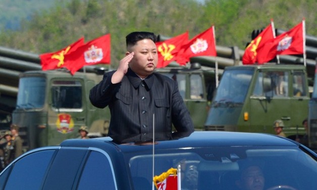 North Korea's leader Kim Jong Un inspects artillery launchers ahead of a military drill - REUTERS
