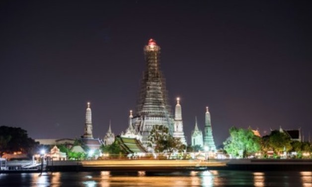 © AFP | The two tourists photographed themselves baring their buttocks in front of Bangkok's famous Wat Arun