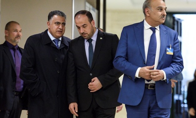 Head of the Syrian Negotiation Commission (SNC) Nasr al-Hariri (3rd L) arrives with opposition delegation members Khaled al-Mahamid (2nd L) and Jamal Suliman for a new round of Syria's peace talks at the United Naitons in Geneva, Switzerland November 28, 