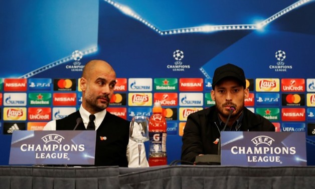 Soccer Football - Champions League - Manchester City Press Conference - Naples, Italy - October 31, 2017 Manchester City manager Pep Guardiola and Manchester City's David Silva during the press conference Action Images - Reuters/Andrew Boyers