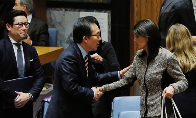 United States ambassador to the United Nations (UN) Nikki Haley shakes hands with South Korean ambassador to the United Nations (UN) Cho Tae-yul after a meeting of the UN Security Council to discuss a North Korean missile launch at UN headquarters in New 