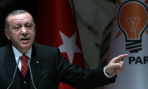 © AFP/File | Turkish President Recep Tayyip Erdogan has rejected claims his family sent millions of dollars offshore as "lies"