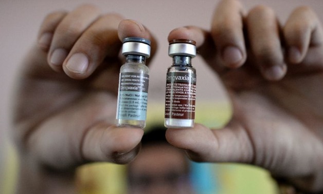 French pharmaceutical giant Sanofi said its world-first dengue vaccine could lead to more severe symptoms for people who had not previously been infected (AFP Photo/NOEL CELIS)