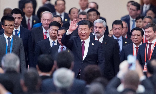 China's President Xi Jinping (C) arrives with leaders at the opening ceremony of the "CPC in dialogue with world political parties" high-level meeting, at the Great Hall of the People in Beijing, China December 1, 2017. REUTERS/Fred Dufour/Pool

