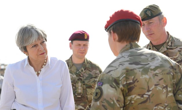 Britain's Prime Minister Theresa May meets British troops and watches training of Iraqi security forces at the Camp Taji military base near Baghdad, Iraq, November 29, 2017. REUTERS/Toby Melville