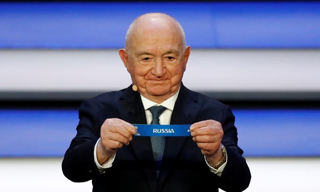 Soccer Football - 2018 FIFA World Cup Draw - State Kremlin Palace, Moscow, Russia - December 1, 2017 Nikita Simonyan pulls out Russia during the draw REUTERS/Kai Pfaffenbach