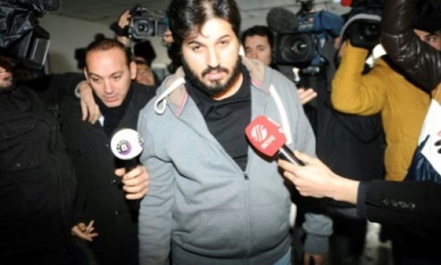 © AFP/File | The Istanbul public prosecutor said the assets of Reza Zarrab (C) and his family would be confiscated as part of a probe, Anadolu news agency said